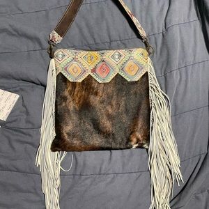 Dancing Cactus Designs cowhide purse. Brand new!! $280 shipped